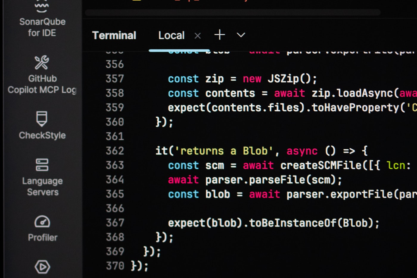 Code on a dark monitor